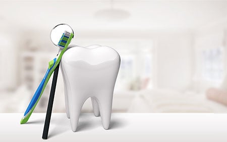toothbrush and giant tooth